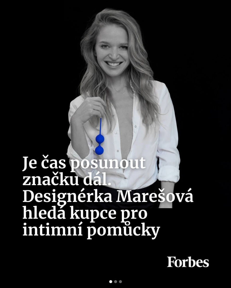 Black and white portrait of designer Anna Maresova holding blue pelvic floor beads on the Forbes cover, covering the business growth of Whoop-de-doo.