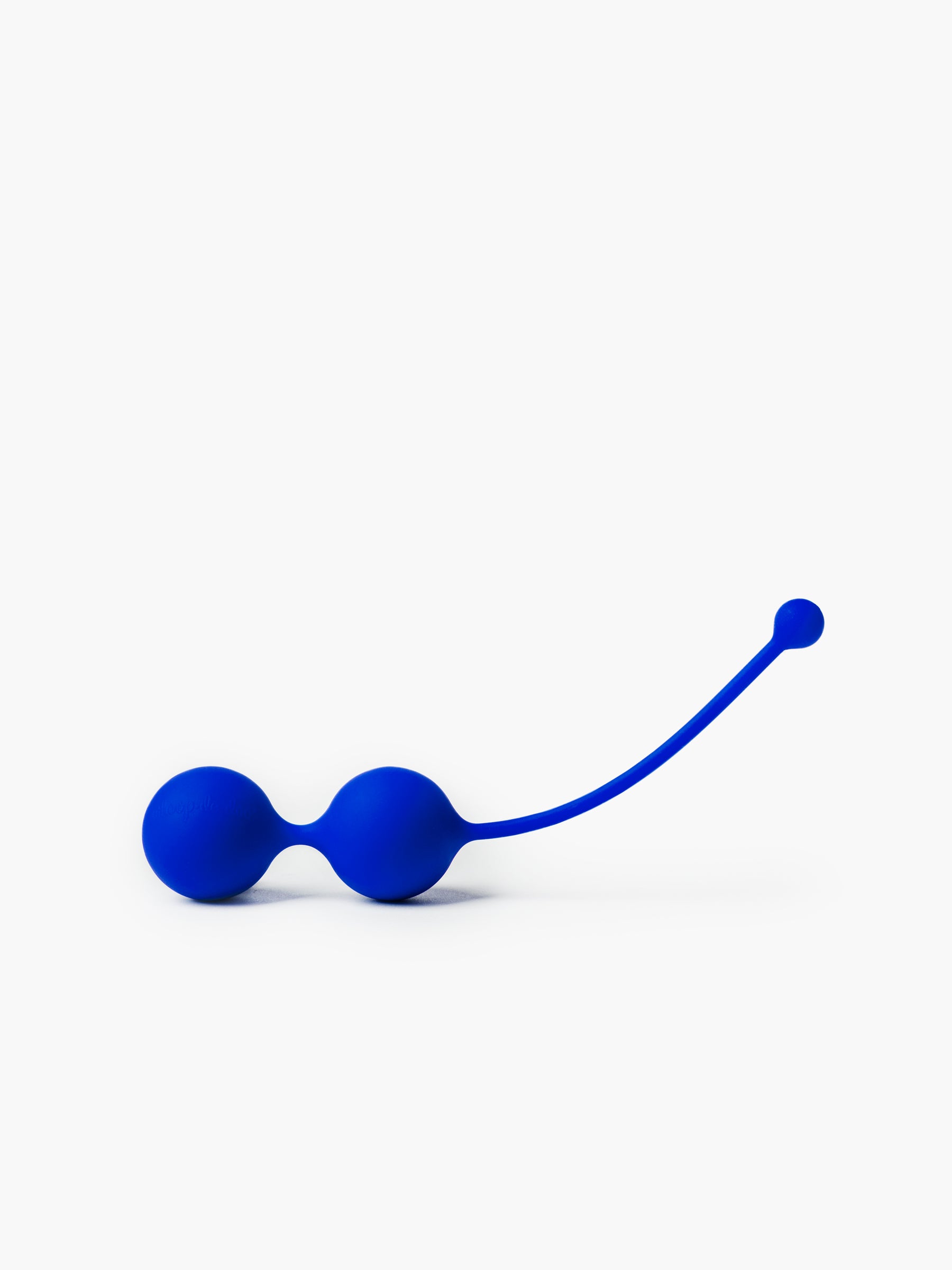 Blue Whoop-de-doo Kegel balls made of medical-grade silicone for pelvic floor muscles strengthening on a white background.