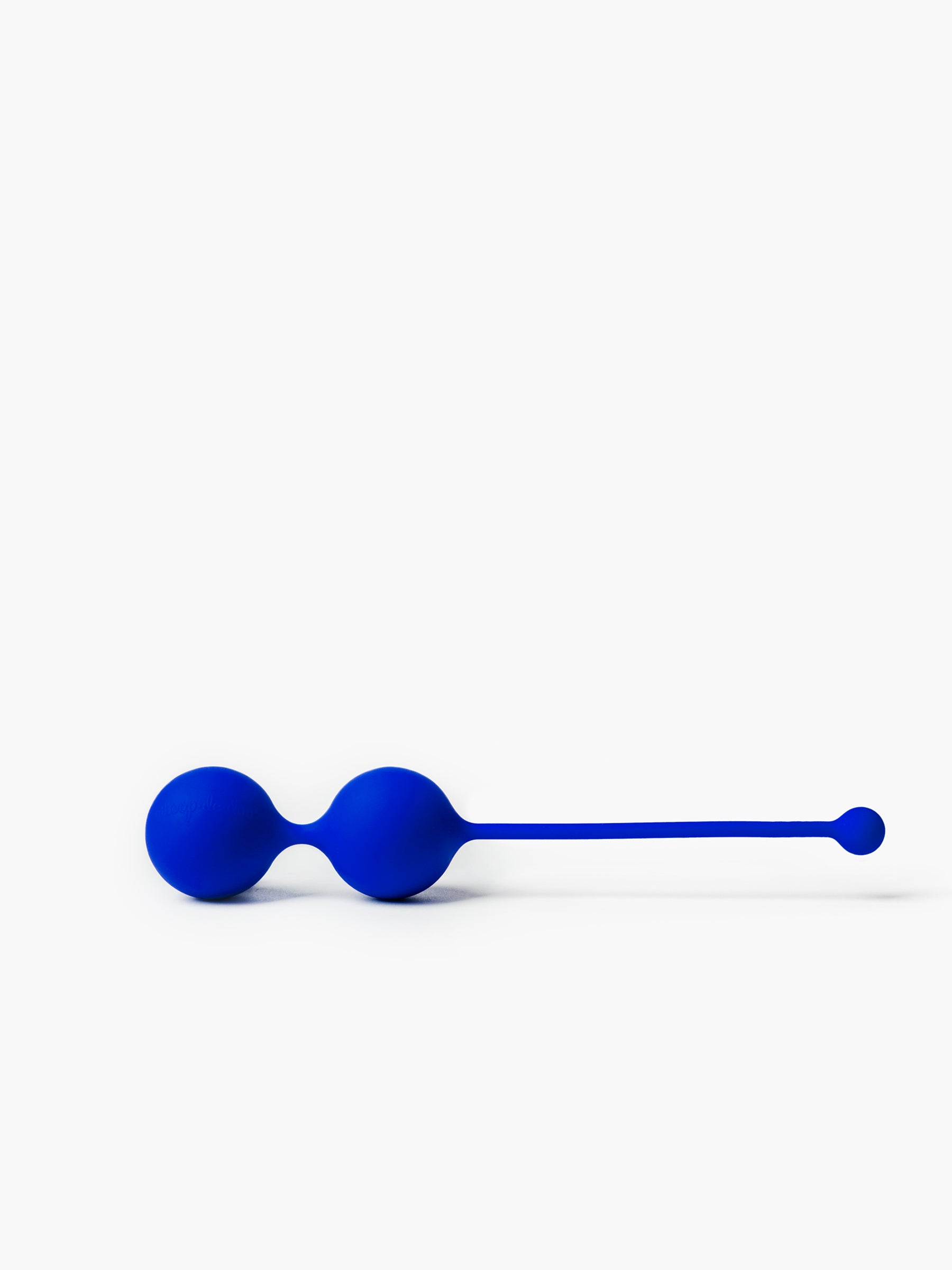 Close-up of blue Whoop-de-doo Kegel balls made of premium medical-grade silicone from the Iconic Blue Edition.