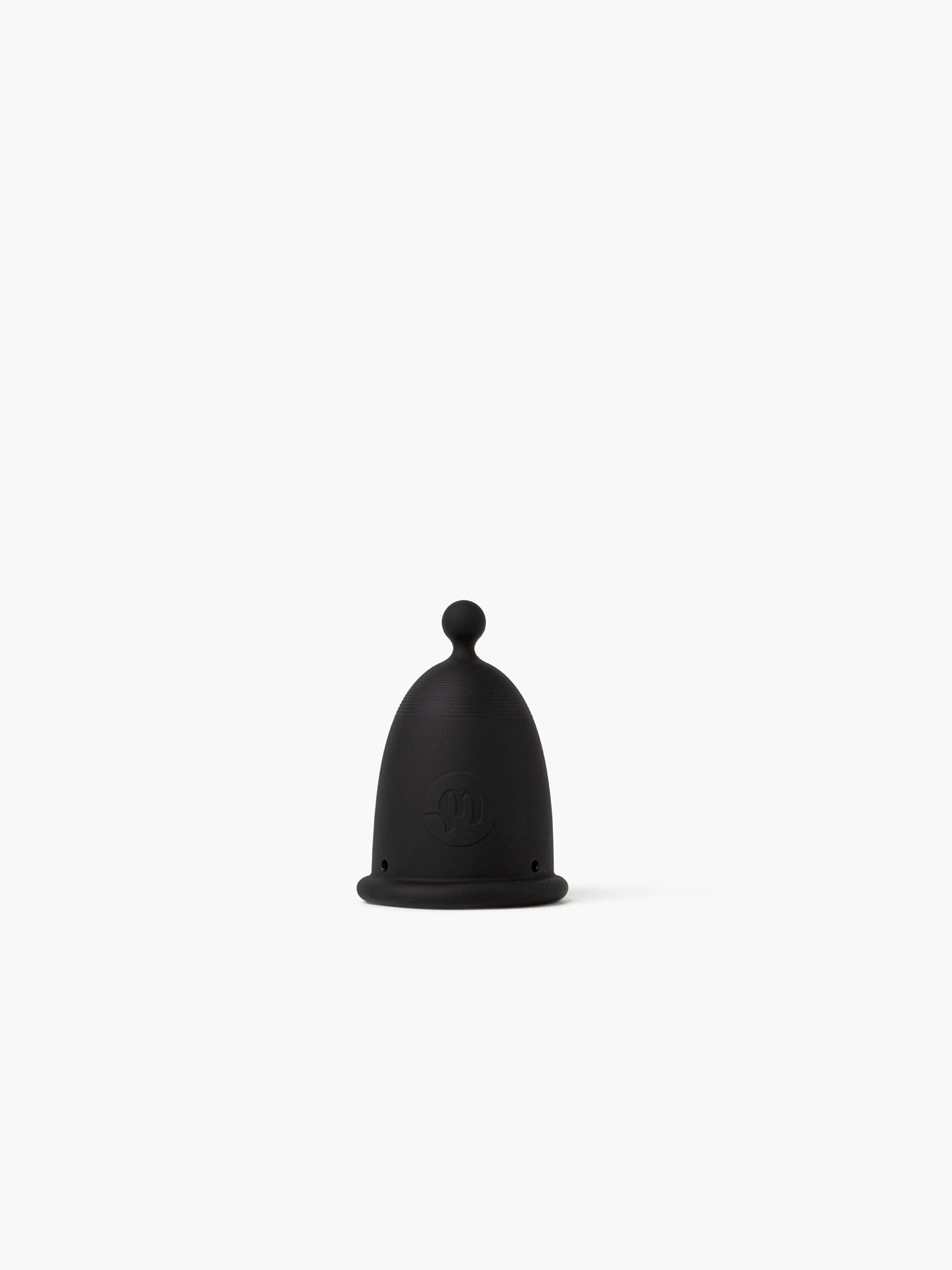 Detailed view of the black-grey Whoop-de-doo Menstrual Cup Classic made from soft medical-grade silicone without packaging.