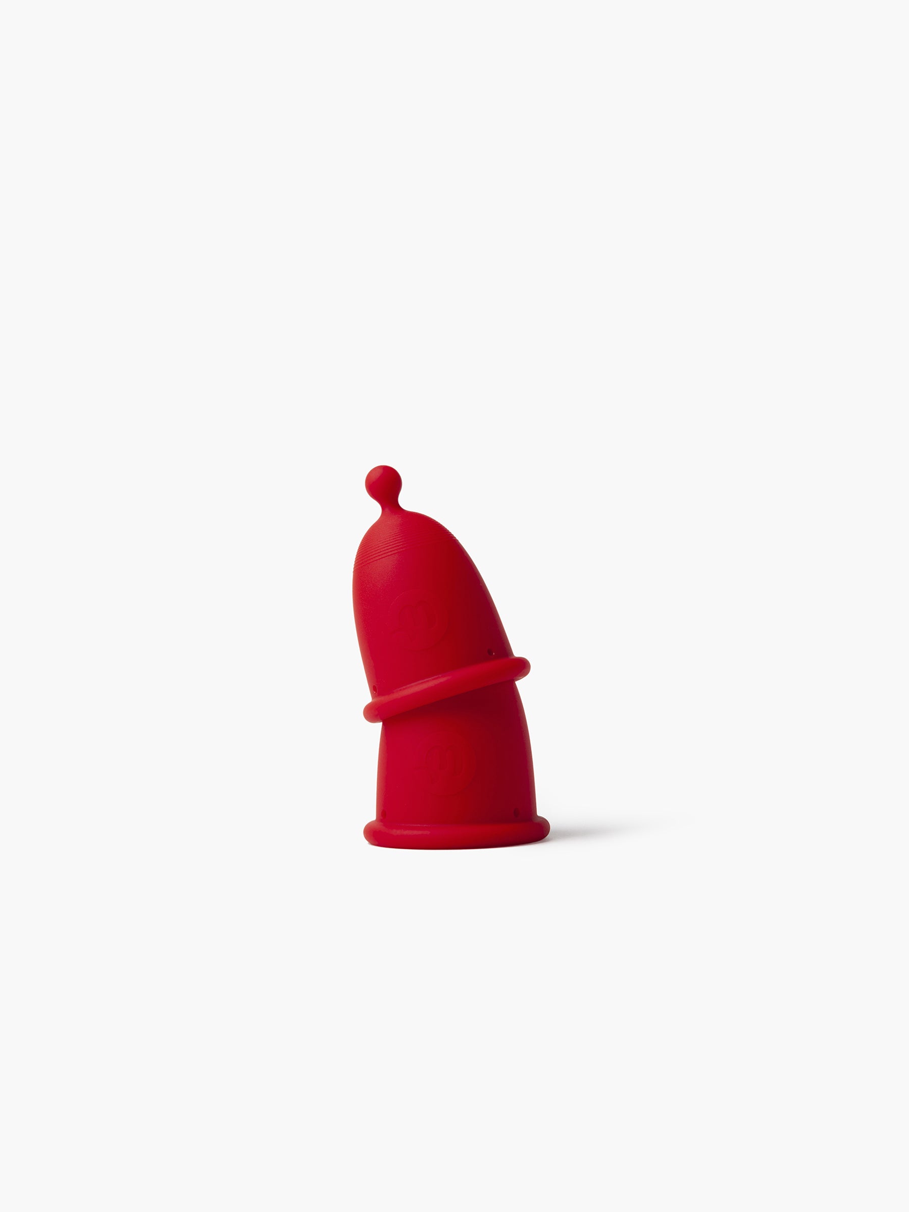Red and black-grey Whoop-de-doo menstrual cups from the Duo pack creatively stacked on top of each other for a clear size comparison.