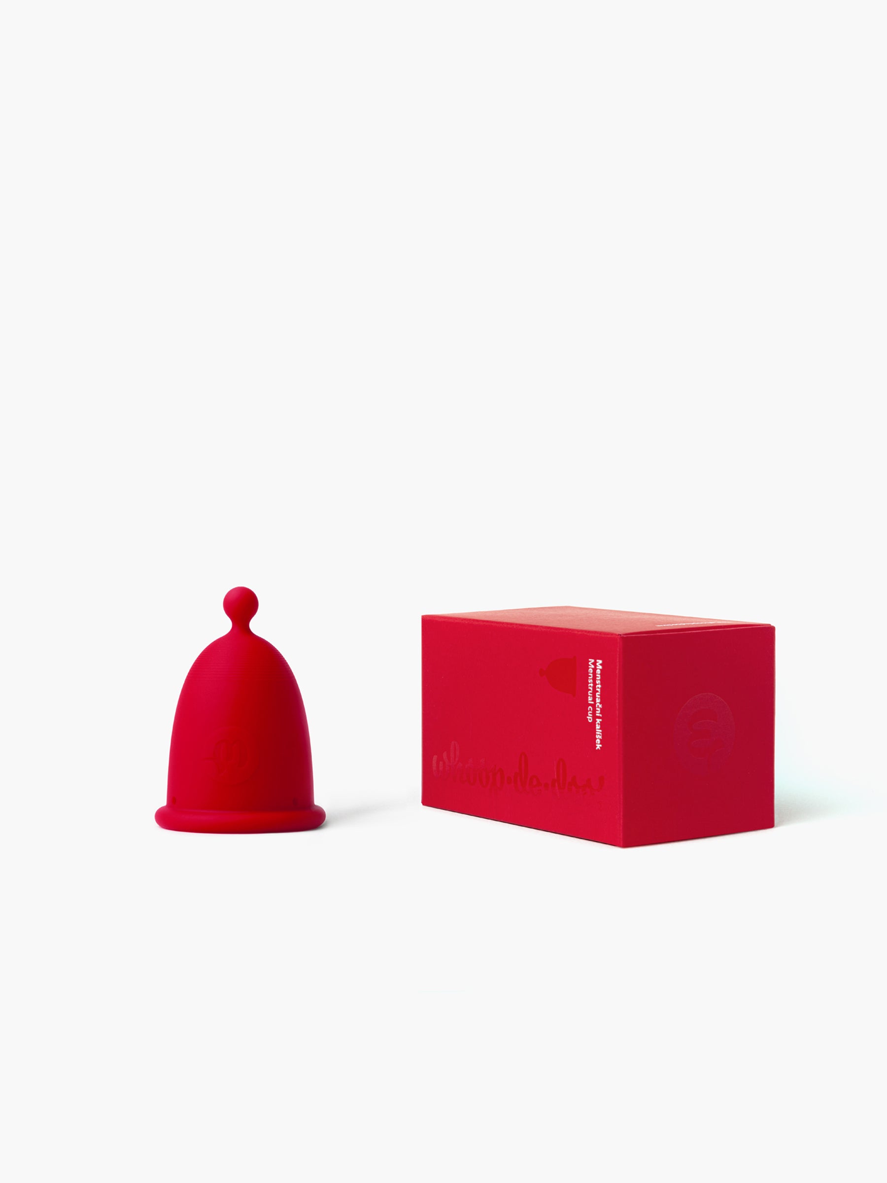 Whoop-de-doo Menstrual Cup Light version in Red Grey shade displayed next to its matching vibrant red packaging box on a white background.