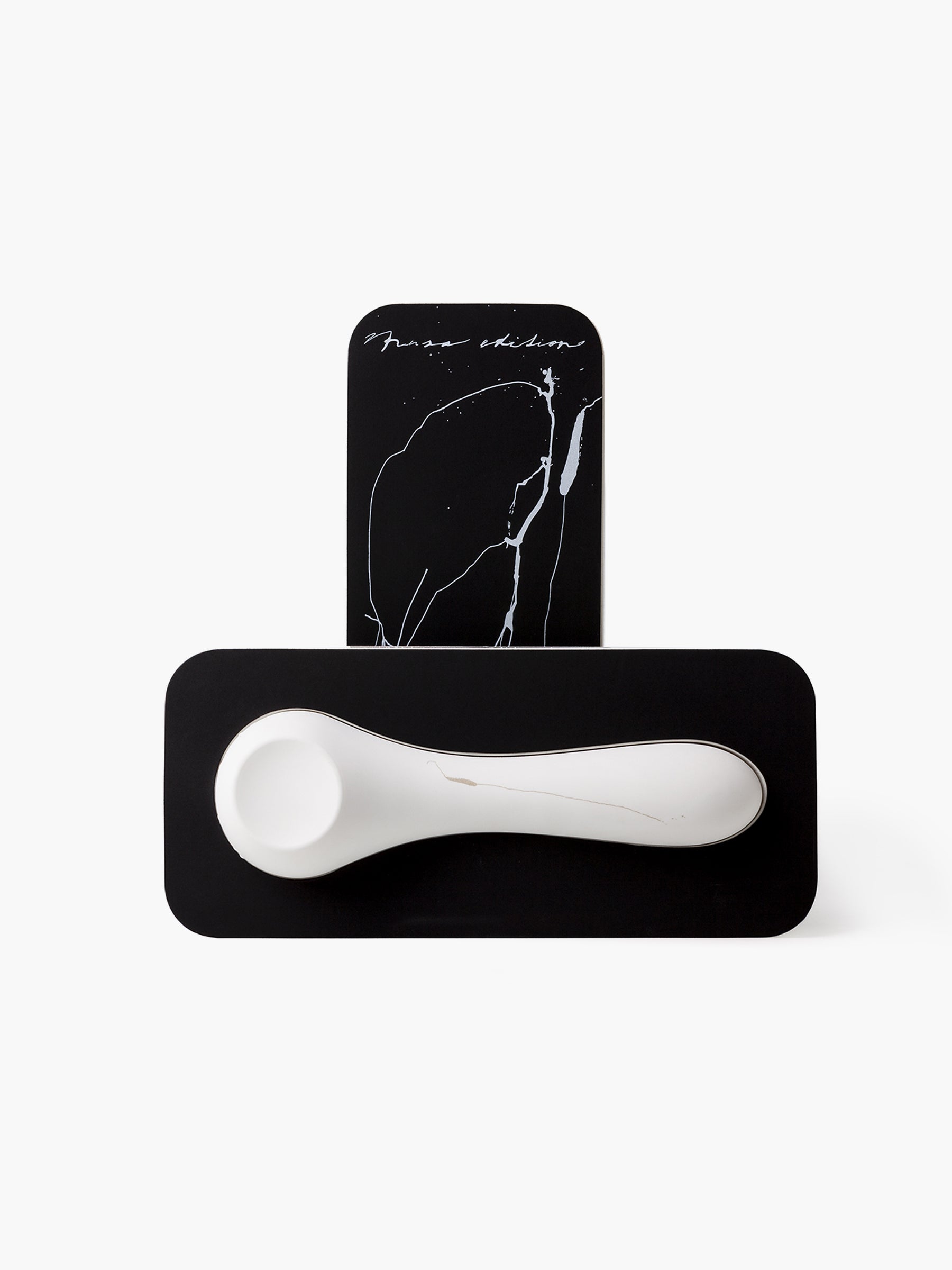 White design vibrator Whoop-de-doo with artistic print from the limited MUSA edition on an open luxury black box.